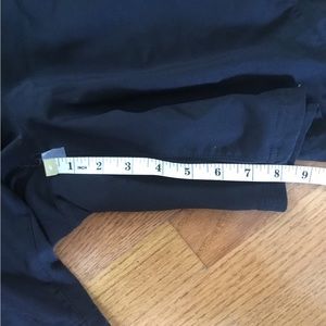 Nike dri-fit tennis shorts.  Black.  8 inch inseam